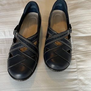 Brand New Navy comfortable cross buckle shoes with Velcro closure.